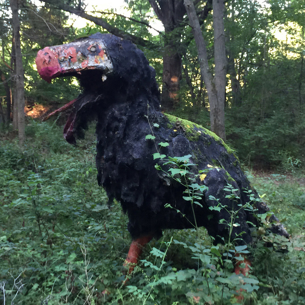 Bird sculpture from white rose network Bandcamp page